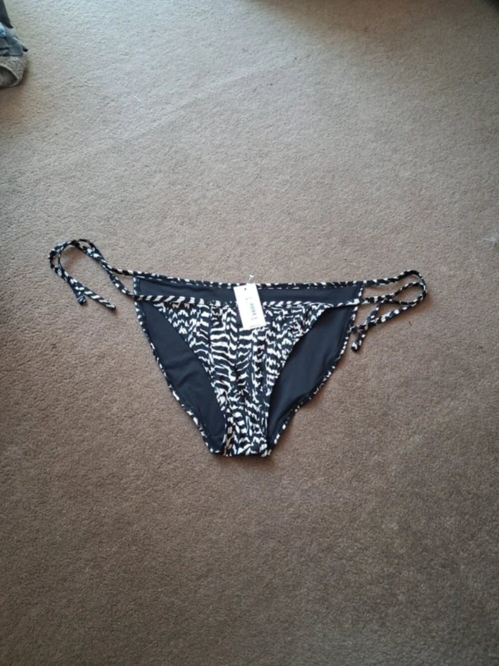 Black and white animal print bikini bottoms